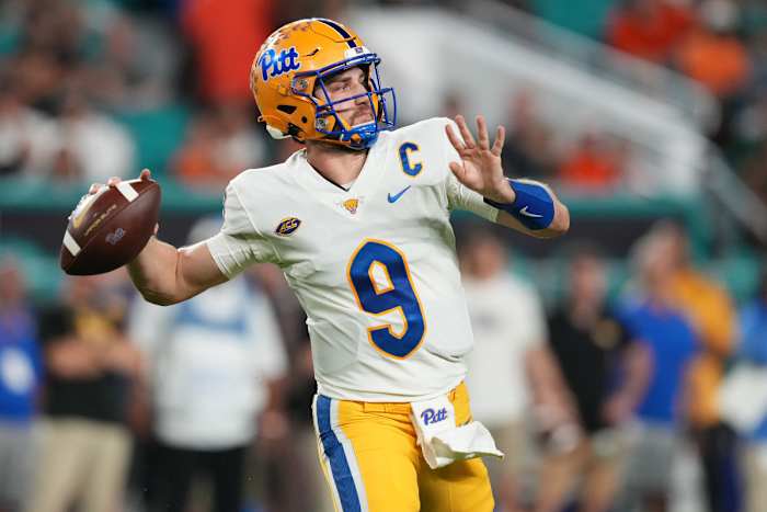 Miami Gardens, Florida, USA; Pittsburgh Panthers quarterback Kedon Slovis (9) attempts a pass against the Miami Hurricanes during the first half at Hard Rock Stadium.
